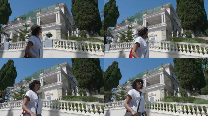 在希腊科孚岛观赏阿基里翁宫的女游客，慢镜头