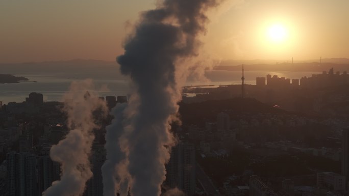 航拍威海市热电厂大烟筒清晨烟雾阳光