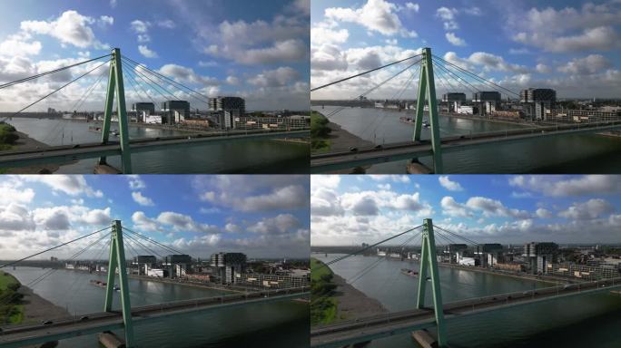 鸟瞰科隆城市天际线的实时镜头与莱茵河上的莱茵港和severinsbrcke桥与天空在科隆，德国