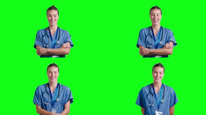 工作室肖像微笑的女医生或护士穿着手术服对着绿屏幕