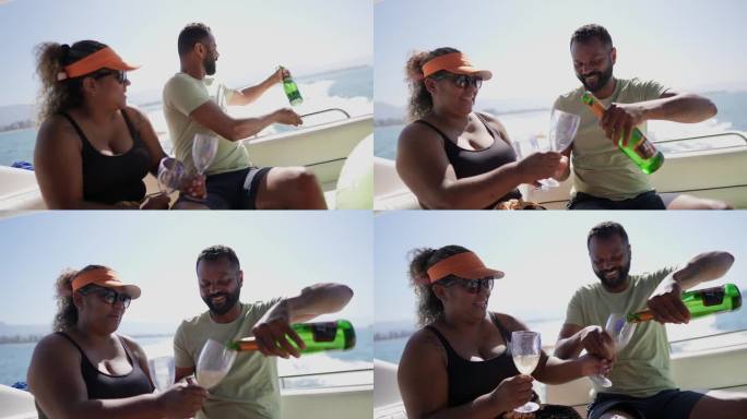 一对成熟的夫妇在游艇上开香槟庆祝