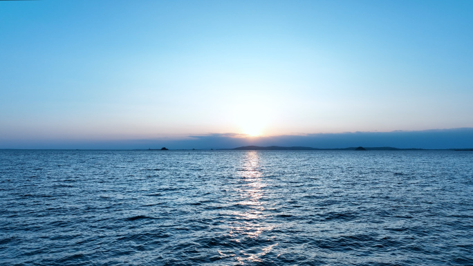 大海航拍海边日出延时飞越海面飞向大海平面