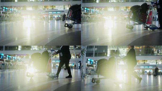 一个成熟的女人推着行李车穿过机场