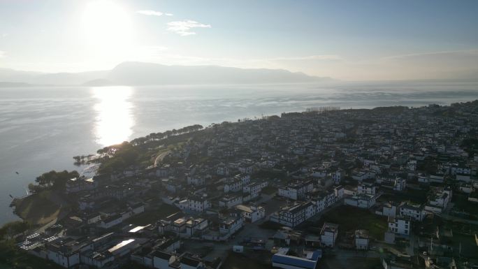 海边湖边村庄日出航拍