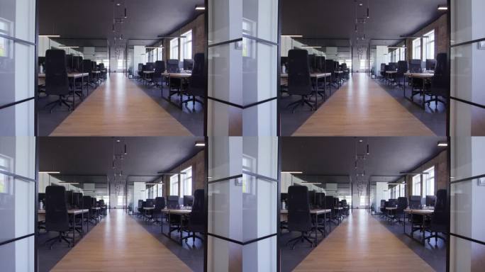 现代创业中心由现代企业环境中的玻璃办公室组成，突出了前沿工作空间的时尚、创新和极简主义设计美学
