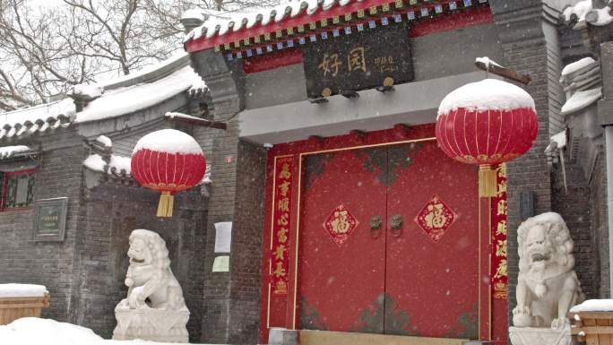 下雪中的北京正阳门前门大街