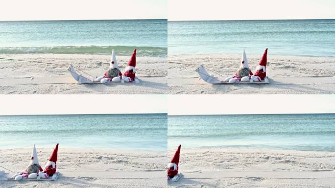圣诞小精灵在沙滩上的白色雪橇在一个阳光明媚的冬日