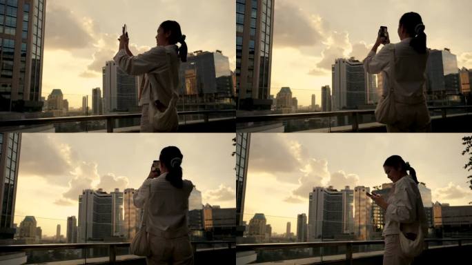 亚洲女性在曼谷市中心游览泰国，欣赏日落时的摩天大楼。