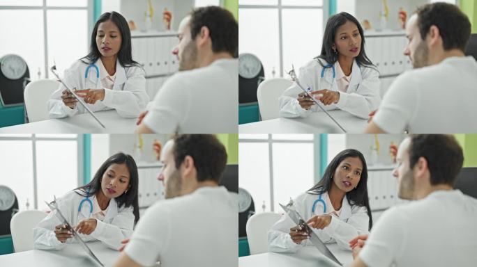 医生和病人坐在桌子上，在诊所出示医疗报告