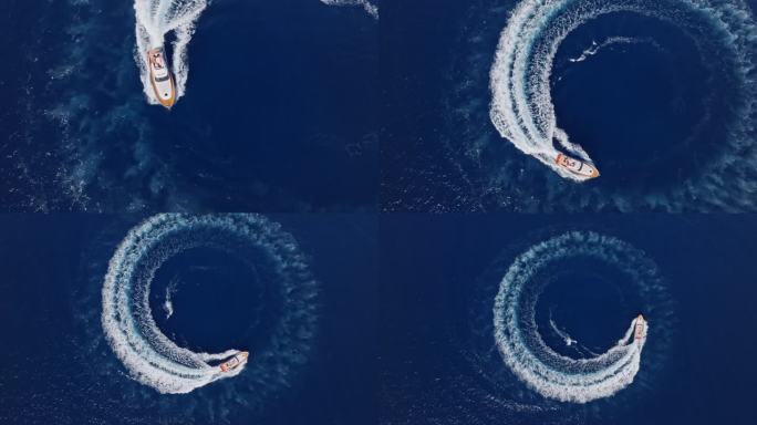 航拍:一艘游艇在阳光下在海上绕圈行驶