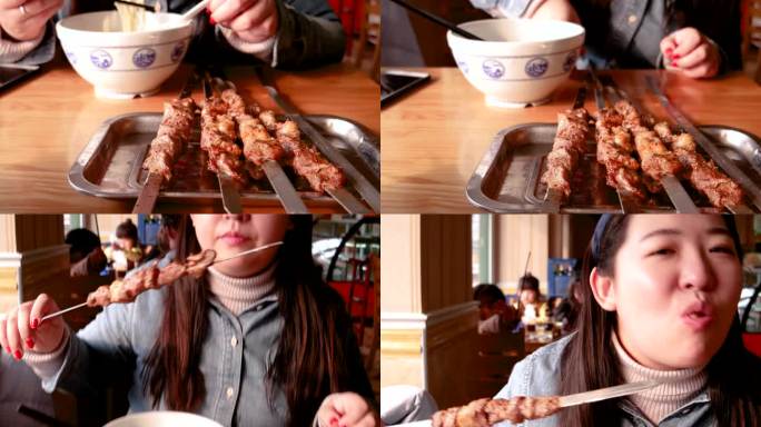 一个女人在餐厅吃烤肉串
