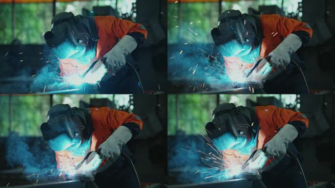 一个正在工作的工业焊工。在这迷人的描绘技能和安全的工厂设置金属遇到火炬火花飞。