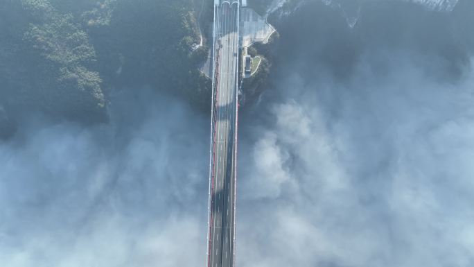 航拍湖南湘西高速公路矮寨大桥云海峡谷山谷