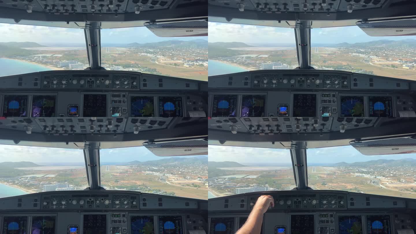 在一个阳光明媚的早晨，从一架空客320的驾驶舱拍摄的在西班牙伊比沙岛机场进场和降落的照片。一个实时飞