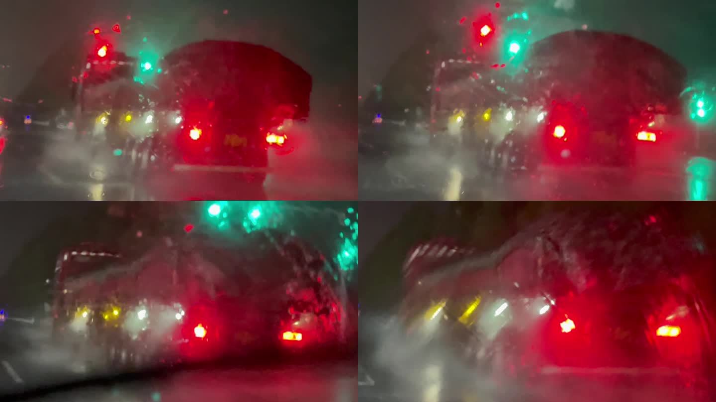 雨夜车窗雨刷道路行车旁边大型运输车