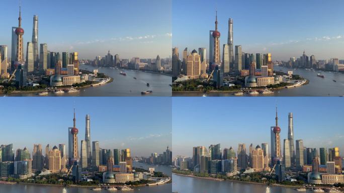 从右到左，横跨美丽的现代上海城市景观和陆家嘴的天际线，包括标志性的东方明珠塔和上海中心大厦