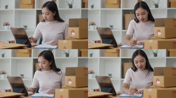 快乐的年轻女性小企业主在她的平板电脑上查看她的销售结果，并在她的记事本上写下结果