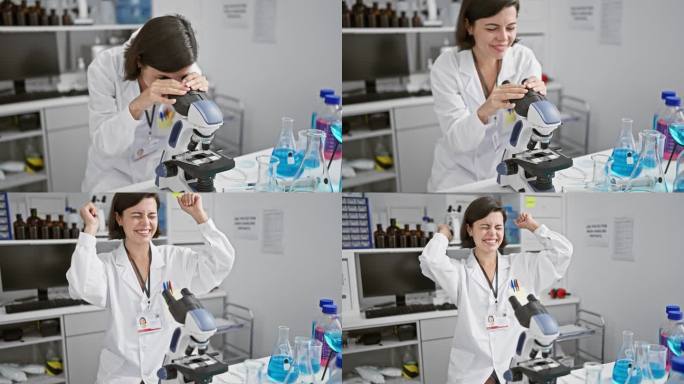 庆祝突破，年轻而美丽的西班牙裔女科学家，高兴地工作与显微镜在实验室里，做出了重大发现