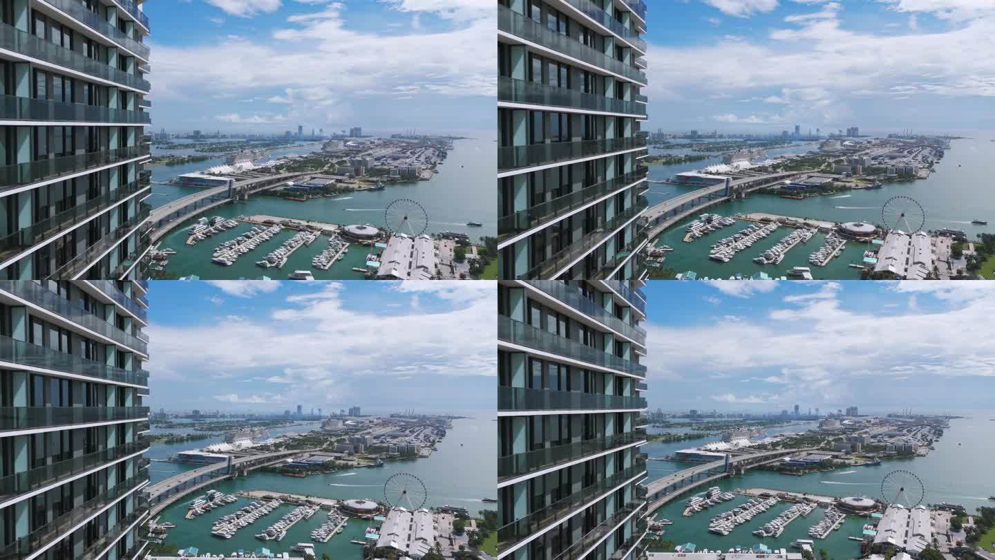 现代高层建筑的基座在阴天对着港口的广阔视野拍摄。世界邮轮之都，欢迎旅客享受奢华生活