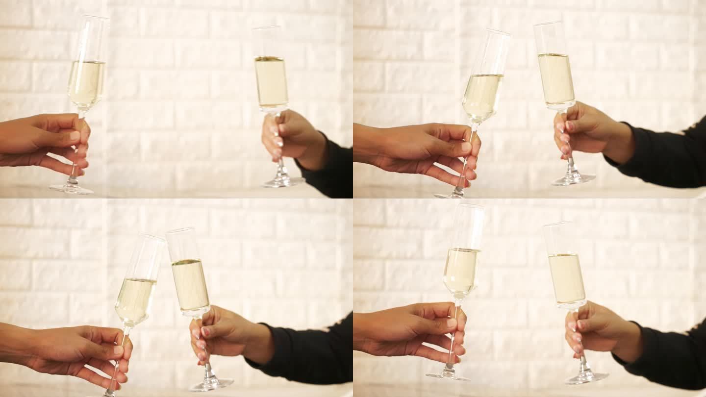 碰杯喝香槟，举杯庆祝。