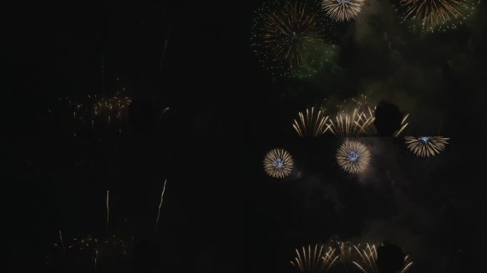 在芭堤雅湖岸，一场令人惊叹的烟花表演，伴随着爆炸性的光和色彩，形成了一场抽象艺术展览，标志着欢快的独