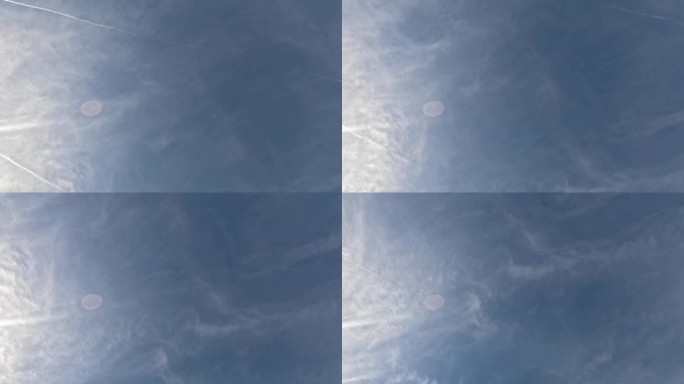 飞机尾迹，或称同构云，是飞机释放的人造云。水蒸气使天空变暗