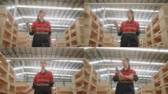 工艺在行动:女工在工厂检查木托盘。