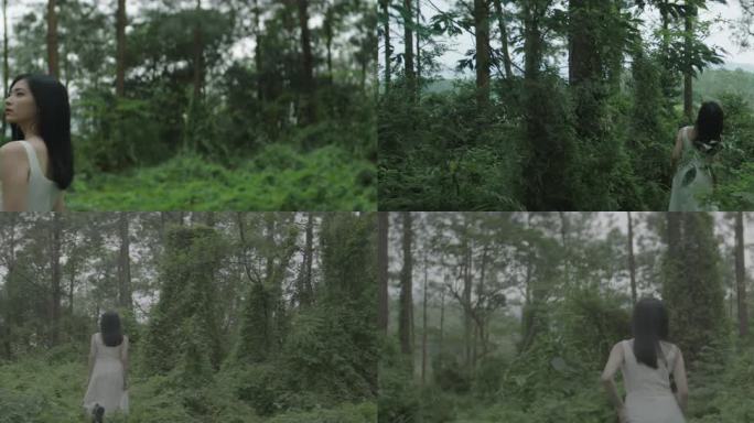 白衣女孩独自在森林中行走