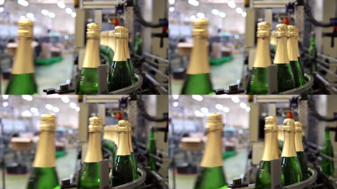 在起泡酒工厂，传送带上的香槟酒瓶。工业规模的葡萄酒生产。