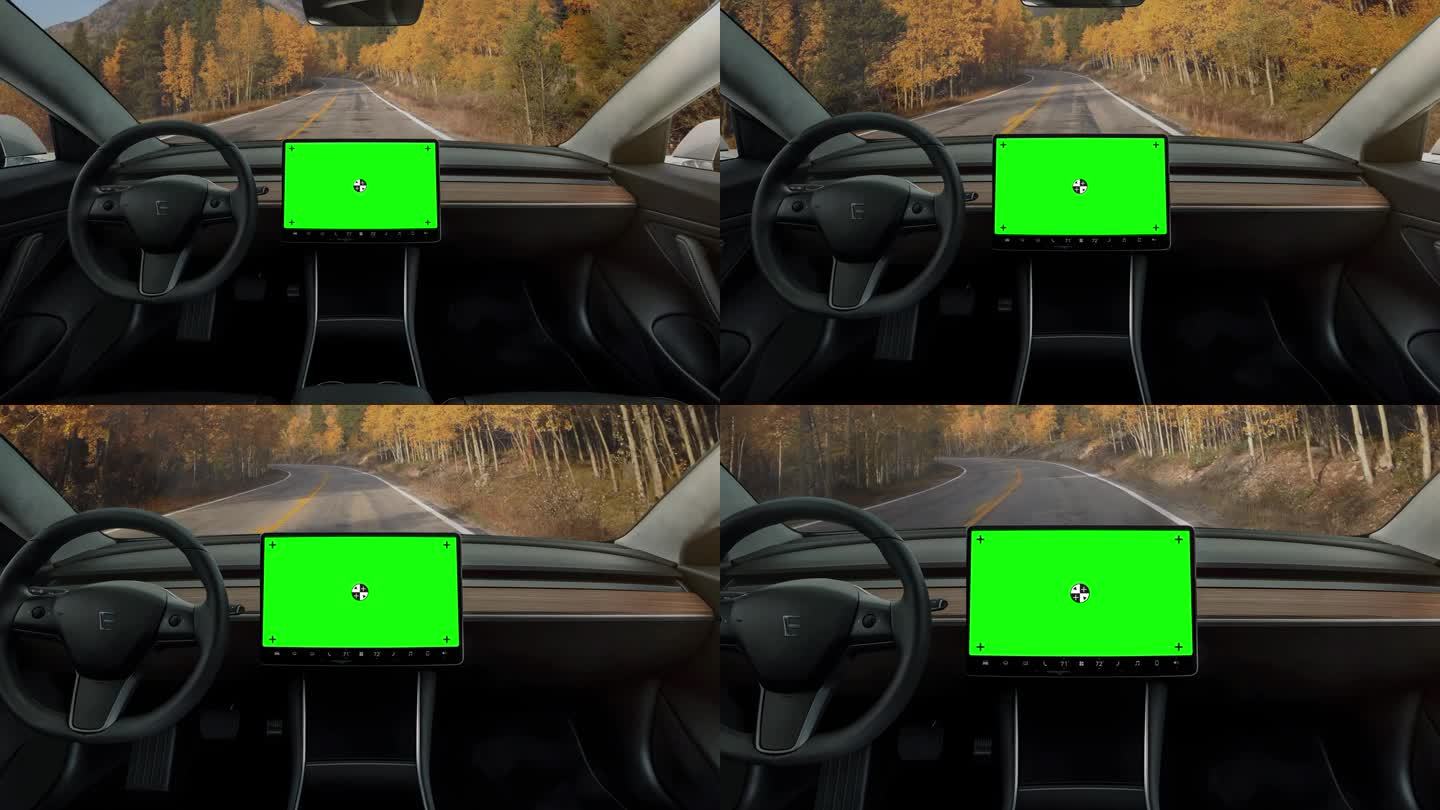 配备绿色屏幕中控台屏幕的自动驾驶电动汽车。