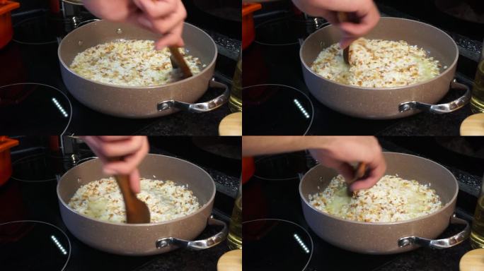 用木勺搅拌米饭