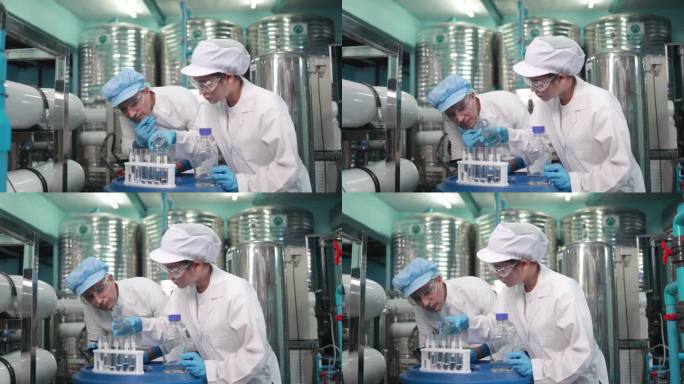 两位科学家在工厂里保证水质