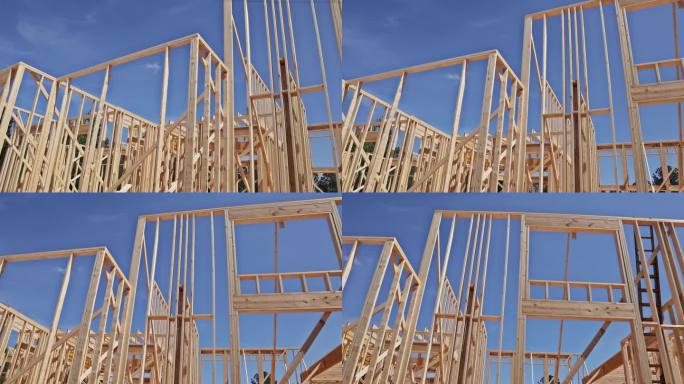 在施工过程中，木结构框架的房屋正在用支撑梁建造