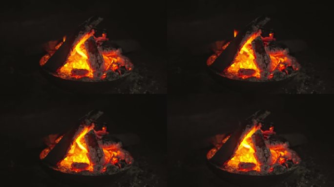 4k冬季盆中燃烧的木炭篝火