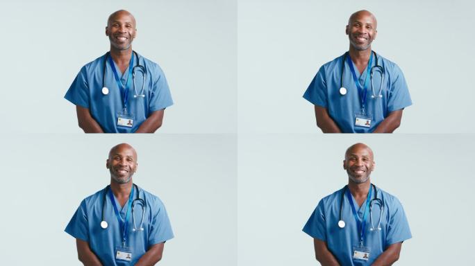 工作室肖像微笑成熟的医生或护士穿着工作服对白色背景