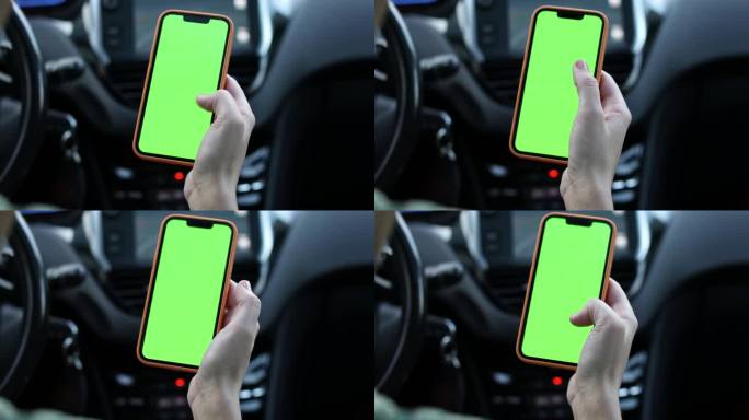 一名女子在车内使用绿屏智能手机