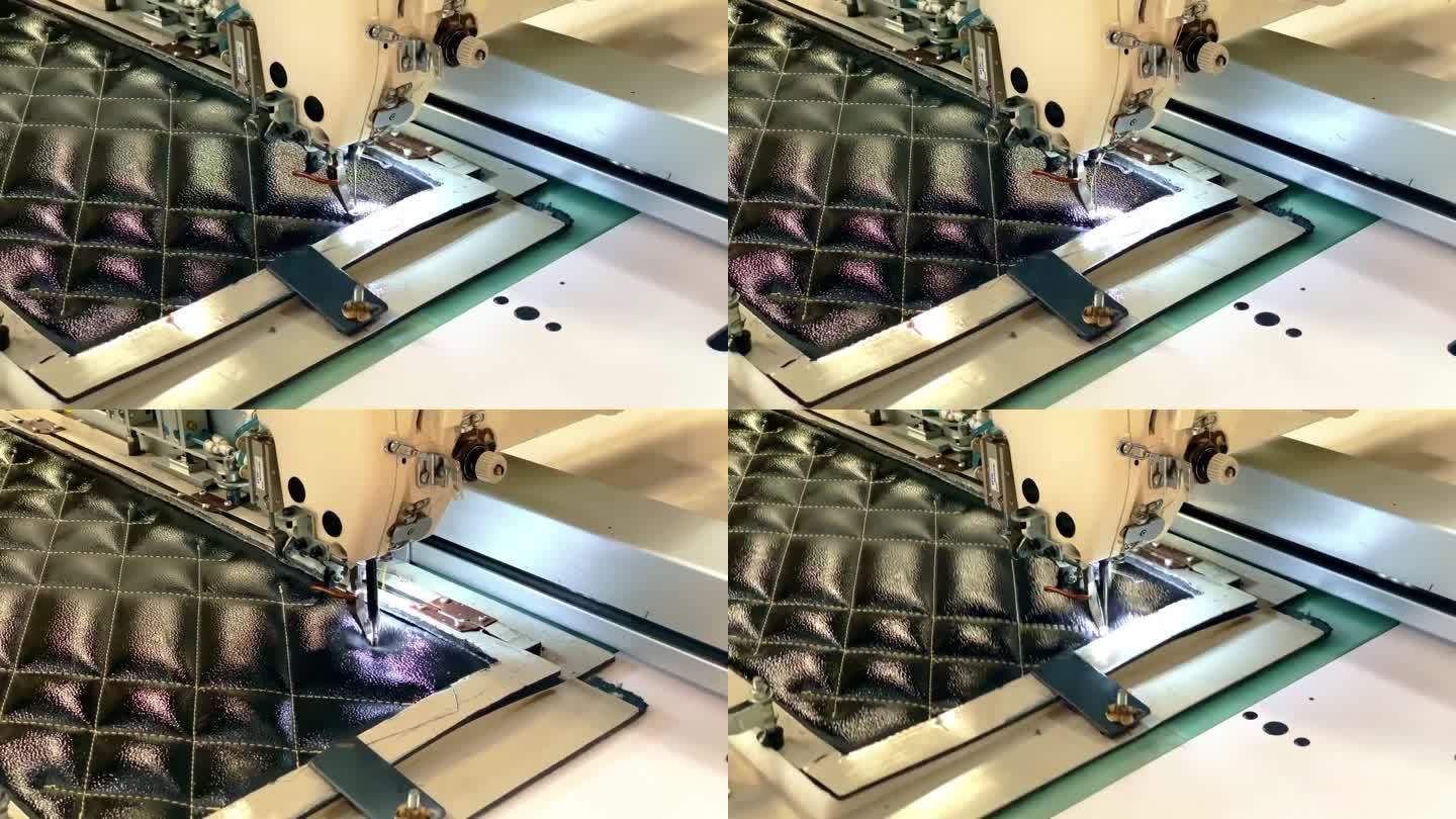 自动缝纫机在黑色面料上缝制图案