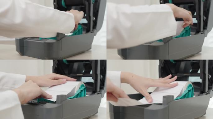 特写，妇女的手插入或放入条码贴纸到条码打印机。
