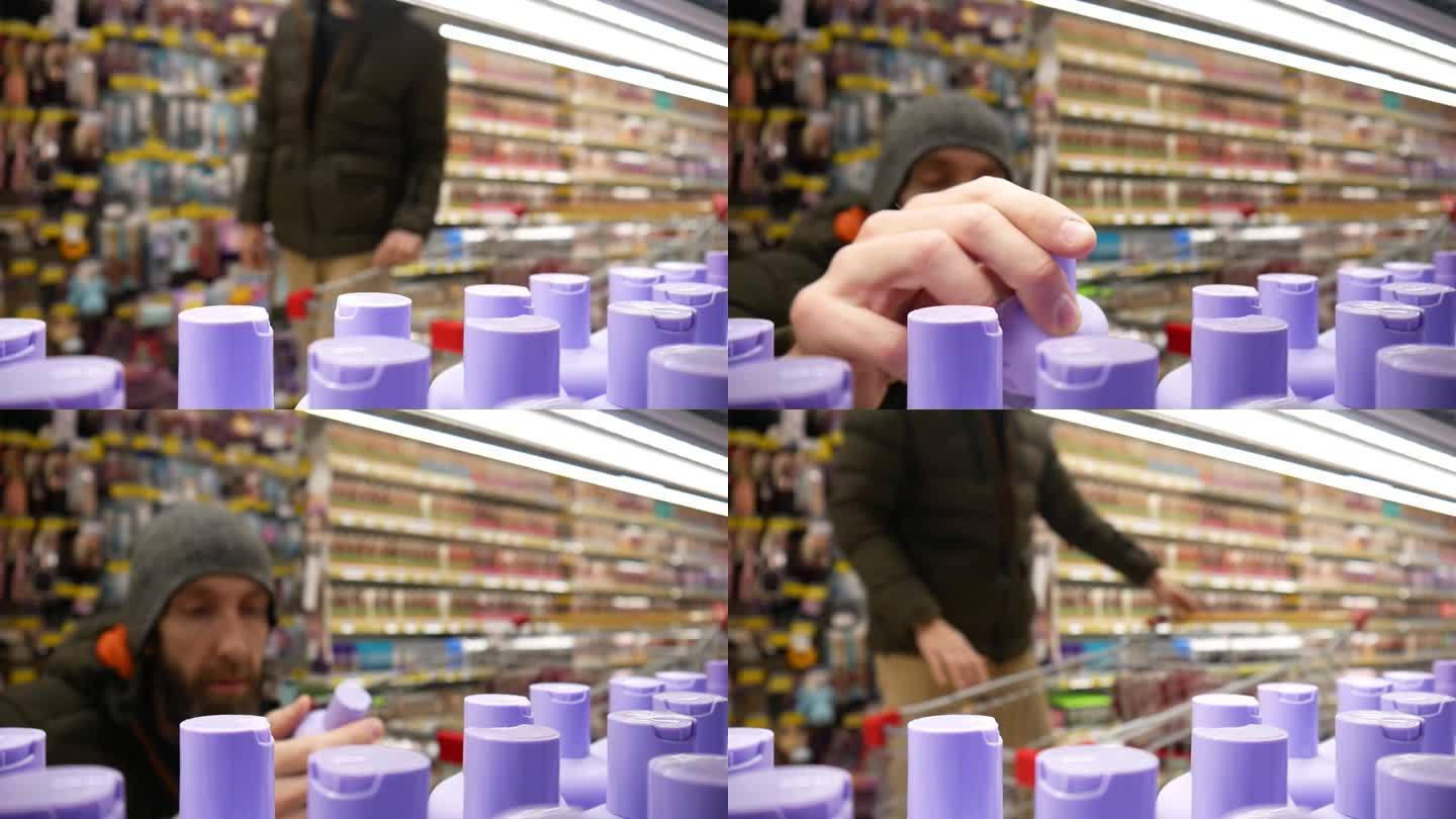 多瓶紫罗兰色洗发水的特写，一位男性买家正在挑选一瓶