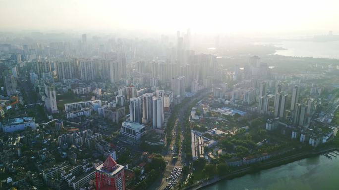 海南海口俯瞰早晨阳光下城市交通建筑风景