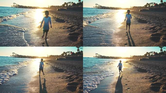 后视图男婴赤脚走在海边的水波与泡沫留下脚印在沙滩上。暑假户外自然风光旅游。孩子们在夕阳下散步。