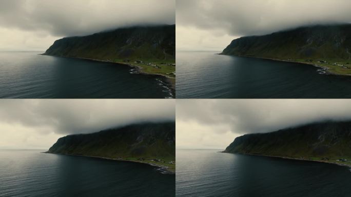史诗般的北欧常绿峡湾，山峰隐藏在雾中。无人机的观点。