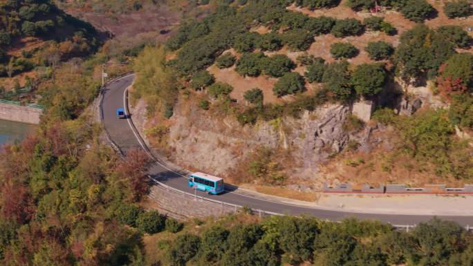 航拍公交车农村山路行驶