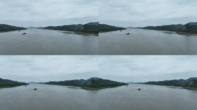 航拍西江梧州段阴天江面货运船内河航运港口