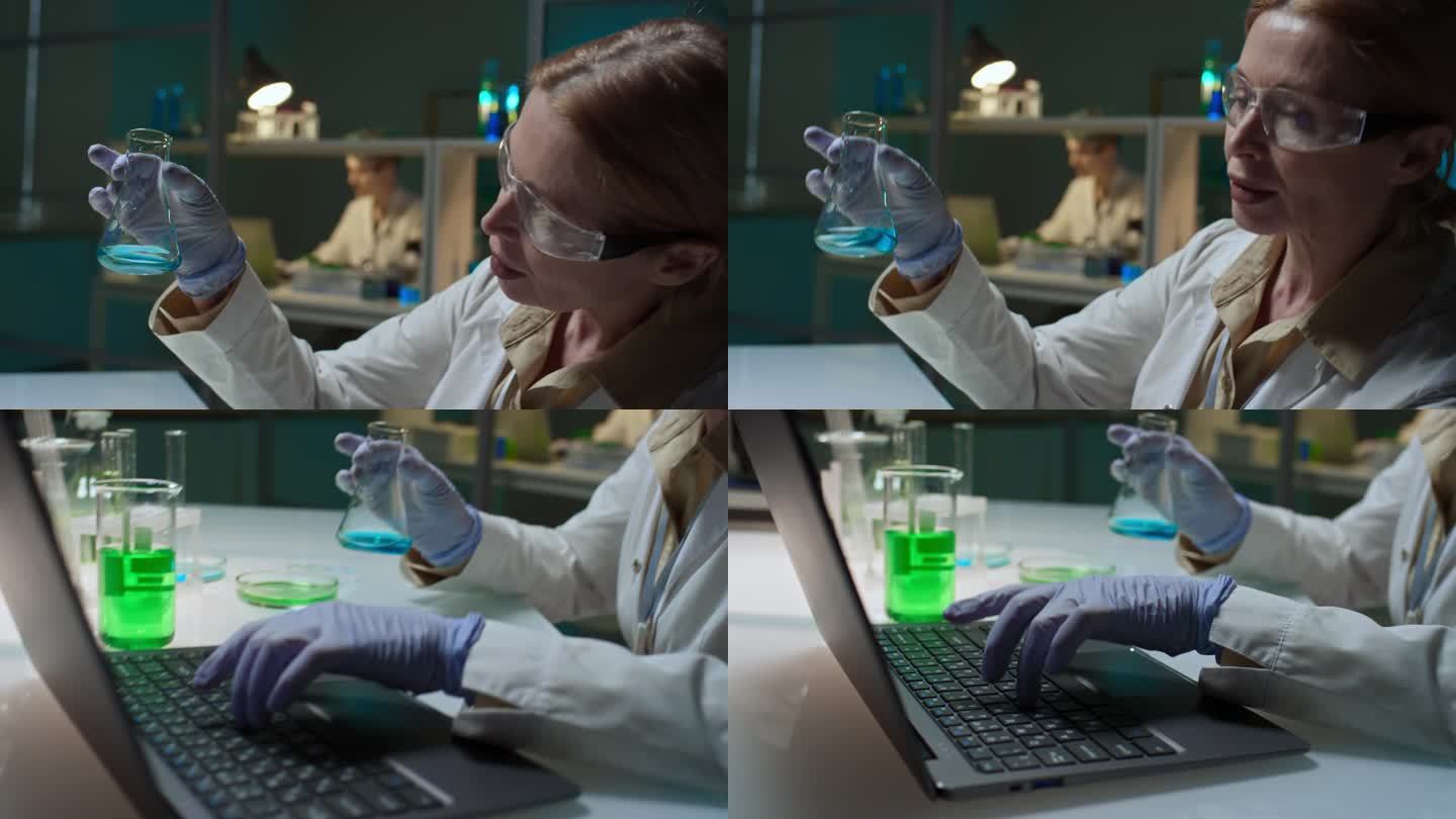 实验室中成熟的生化学检测瓶和笔记本电脑打字