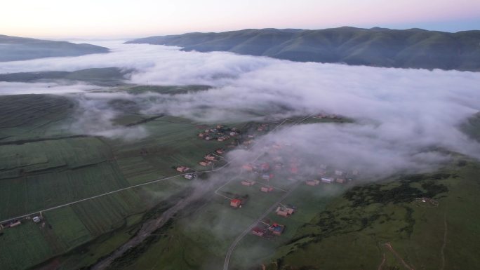 航拍四川阿坝州旅游天空云海郎依寺风景