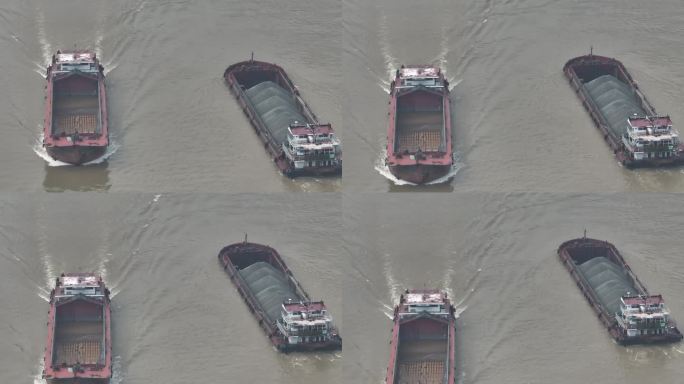 江面货船特写两条船运输砂石散料轮船水运