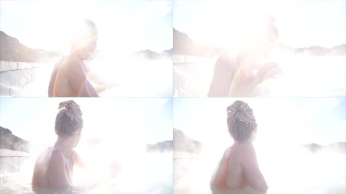 慢镜头:一个女人在室外的温泉浴享受宁静的时刻
