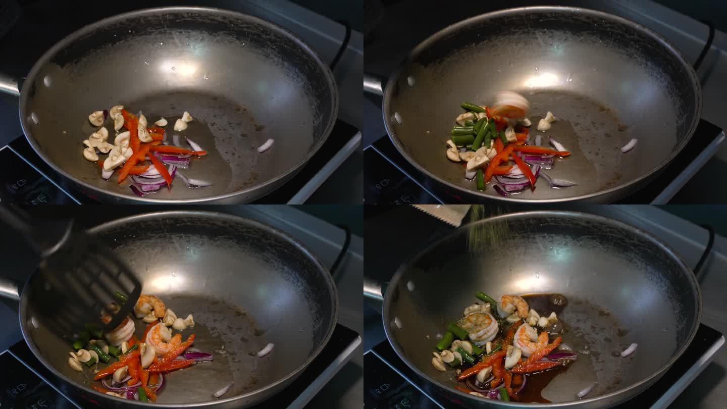日本的食物。虾和蔬菜在煎锅里煎。在寿司店做海鲜。