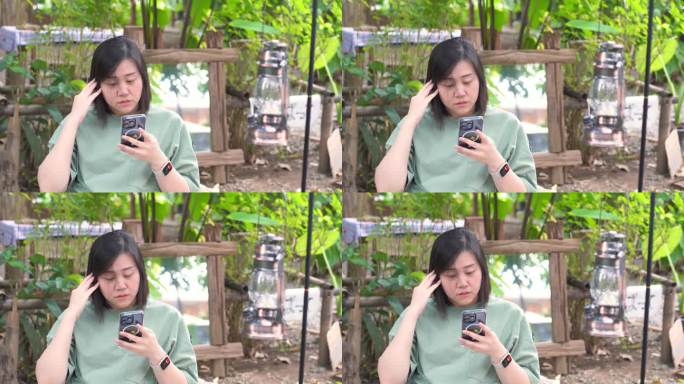 人们的活动理念与经典的灯笼与亚洲妇女露营轻松愉快的早晨的感觉